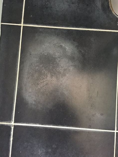 What are the white marks on tiles after cleaning?