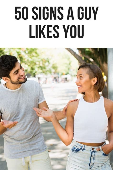 What body language shows a guy likes you?