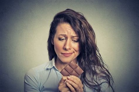 What causes a woman to crave chocolate?