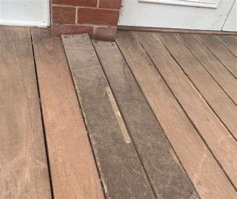 What causes deck boards to warp?