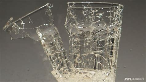 What causes glass to shatter by itself?