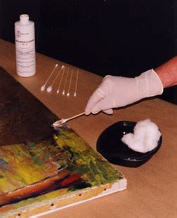 What chemicals are used to restore oil paintings?