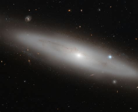 What classification is lenticular galaxy?