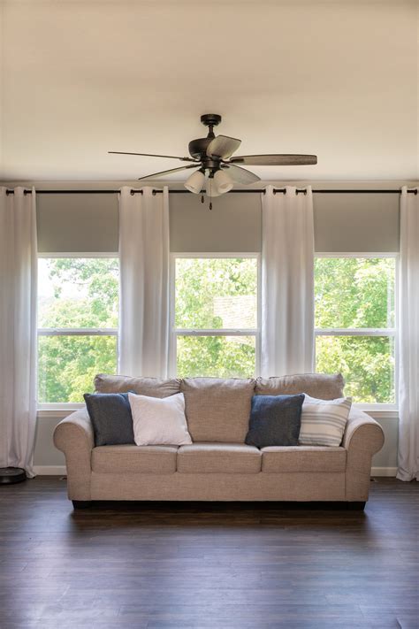 What color curtains make the house look bigger?