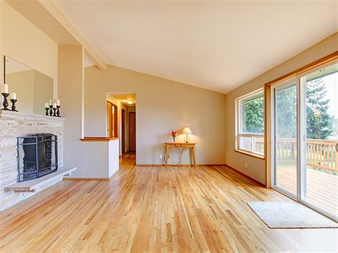 What color flooring makes a small room look bigger?