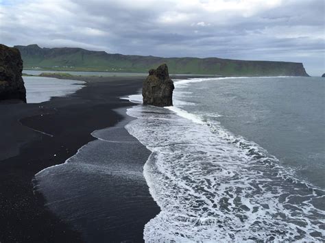What country has black sand?
