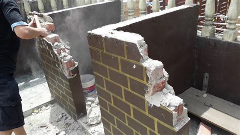 What destroys brick walls?