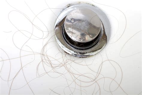 What destroys hair in a drain?