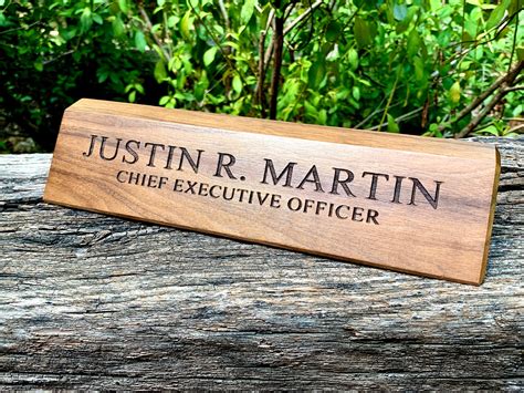 What do you call the nameplate on a desk?