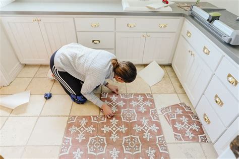 What do you put on floor before peel and stick tile?