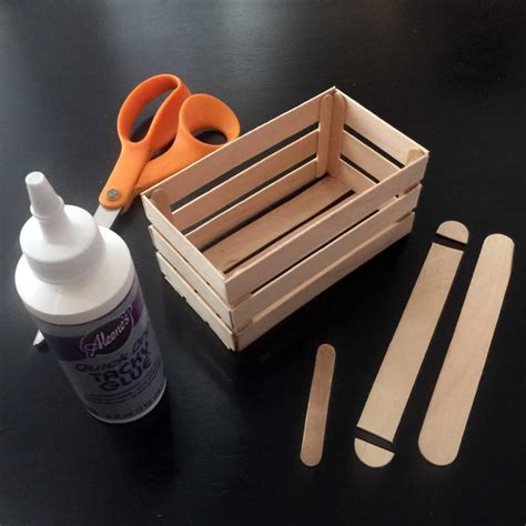 What do you use to glue popsicle sticks?