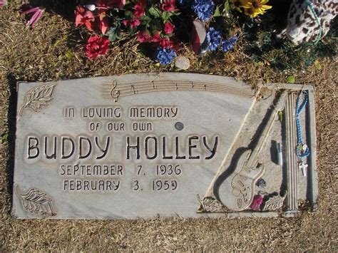 What does Buddy Holly's tombstone say?