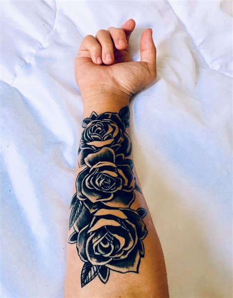 What does a black rose tattoo symbolize?