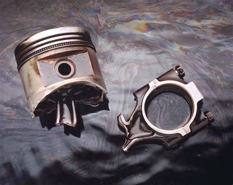 What does a cracked piston sound like?