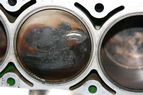 What does a damaged piston look like?