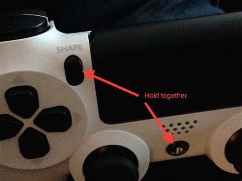 What does holding PS button and share button do?