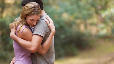 What does it mean when a girl hugs you around the neck?