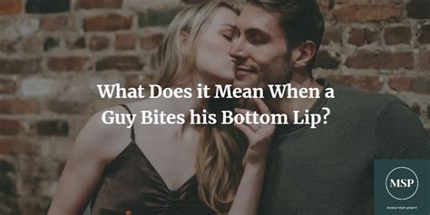 What does it mean when a guy bites your lower lip while kissing?