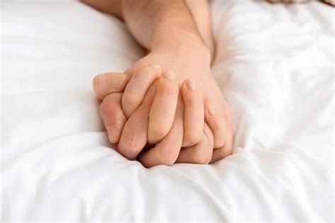 What does it mean when a man holds your hand in his sleep?