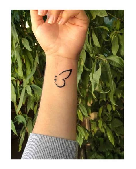 What does the semicolon butterfly tattoo mean?