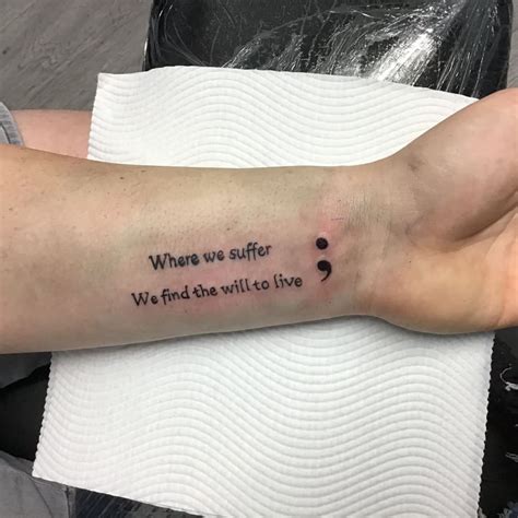 What does the semicolon tattoo mean?