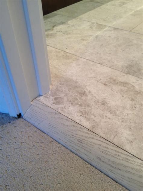 What goes between concrete and carpet?