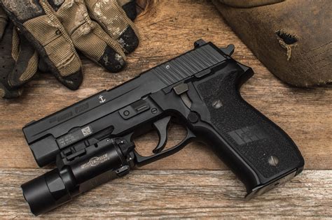 What handgun do Navy SEALs use?