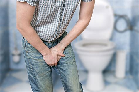What happens if a boy holds his pee?