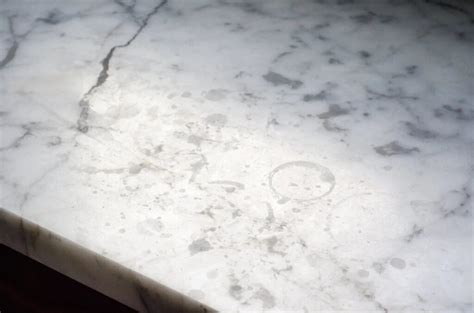 What happens if you leave water on marble?