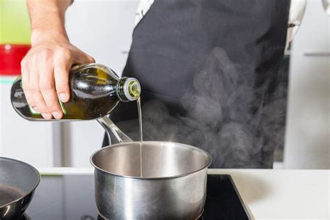 What happens to olive oil at high heat?