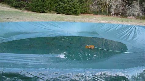 What happens when it rains on a pool cover?