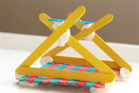 What holds popsicle sticks together?