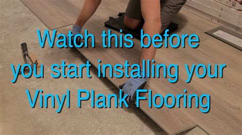 What holds vinyl flooring in place?