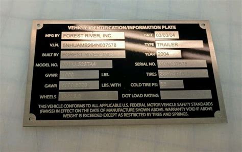 What is a trailer identification plate?