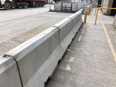 What is another name for a concrete barrier?