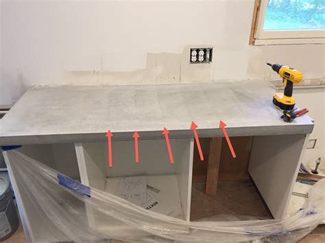 What is ghosting in concrete countertops?