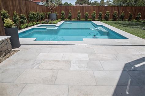 What is the best material for a pool deck?