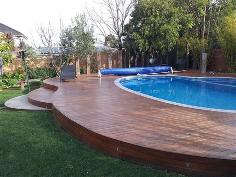 What is the best surface for an above-ground pool deck?