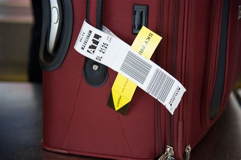 What is the best way to label checked luggage?