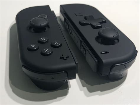 What is the black square under right Joy-Con?