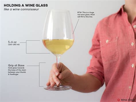 What is the correct way to pour a glass of wine?