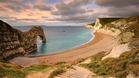 What is the definition of a beach in the coastline?