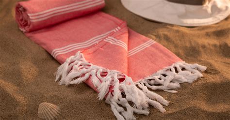 What is the difference between a Turkish towel and a regular beach towel?