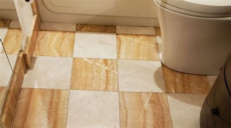 What is the disadvantage of travertine?
