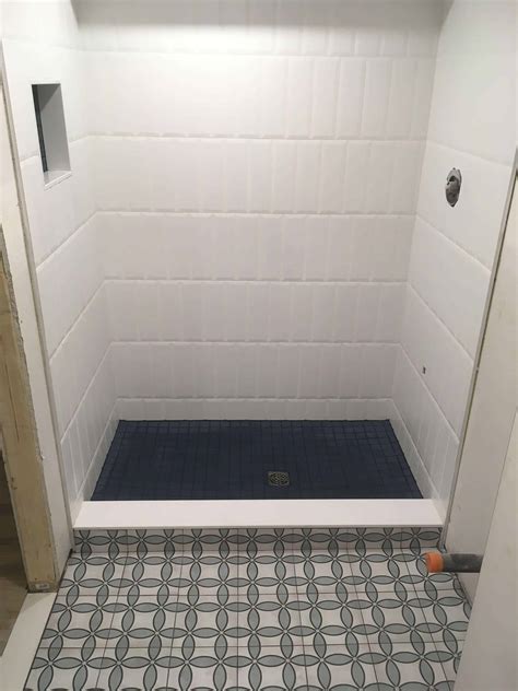 What is the easiest tile for a shower floor?