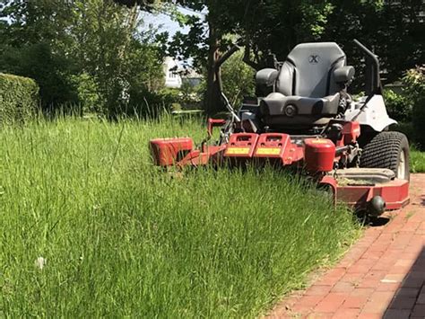 What is the fastest way to cut tall grass?