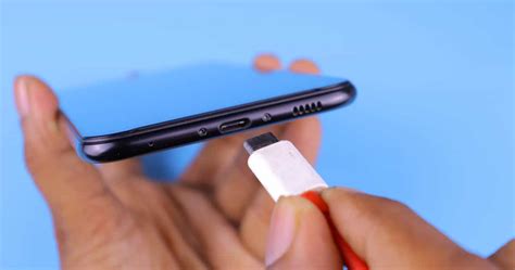 What is the fastest way to get water out of your charging port?