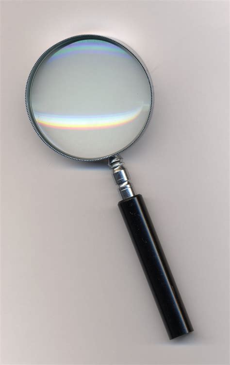 What is the image form of a magnifying glass?