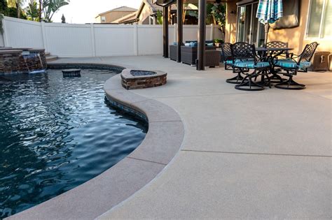 What is the most cost effective pool decking material?