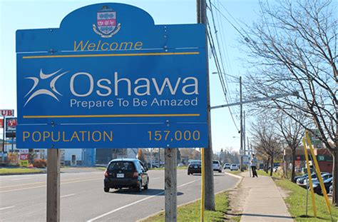What is the slogan of Oshawa?